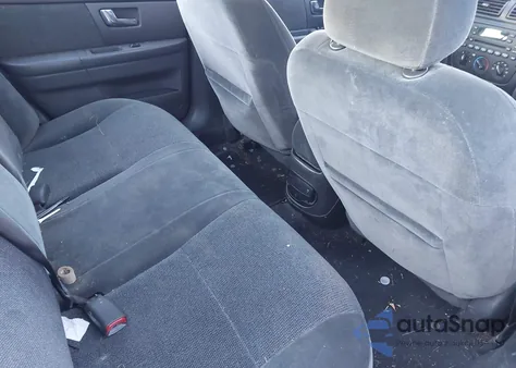 2002 Ford Taurus Ses z USA, uszkodzony, nr VIN 1FAFP55212A226046